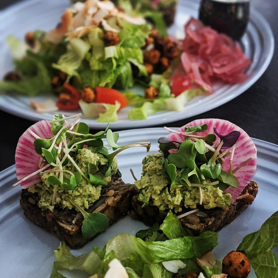 Gourmet avocado toast with microgreens and radish