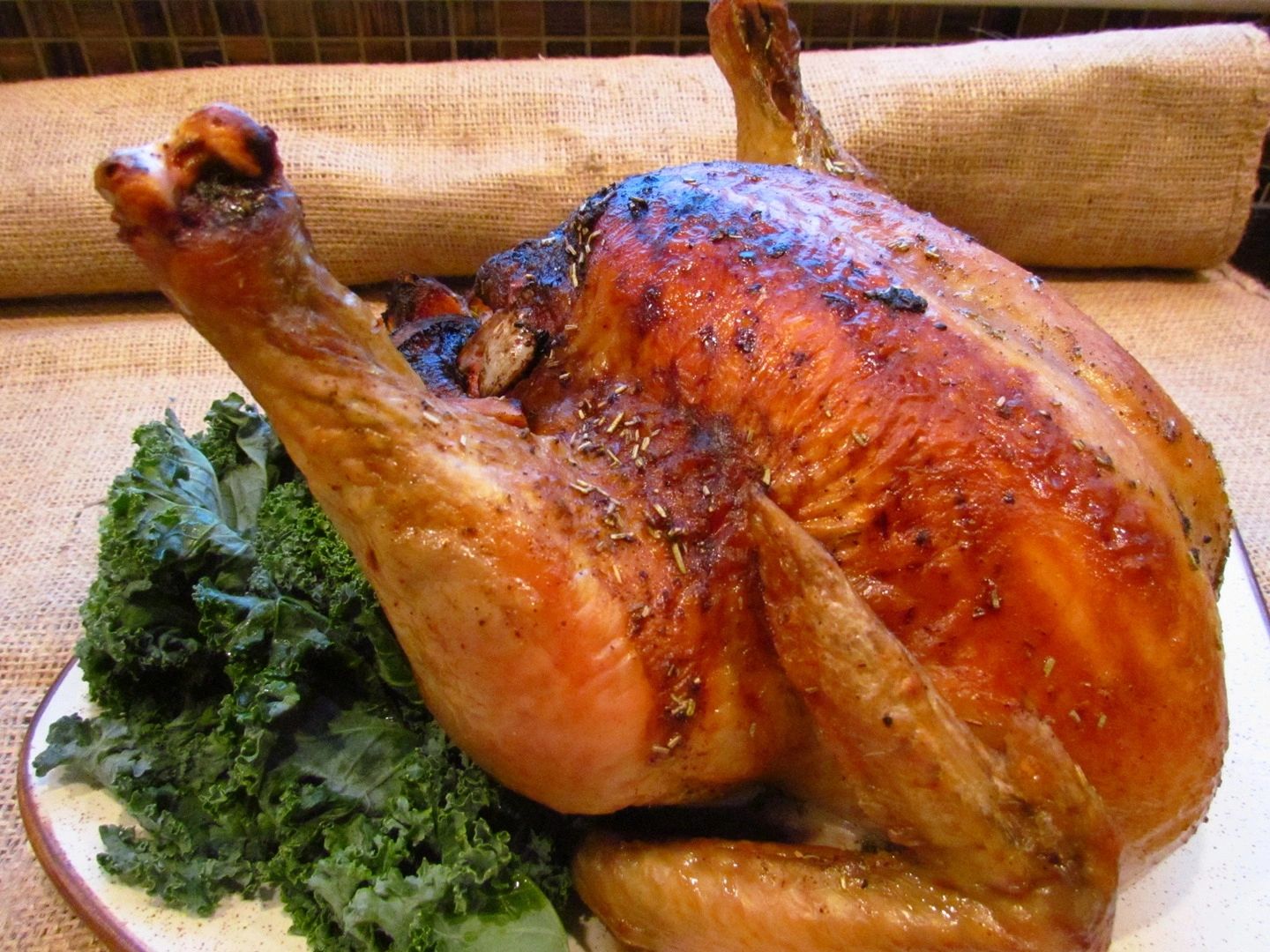 Roasted duck with golden crispy skin and kale